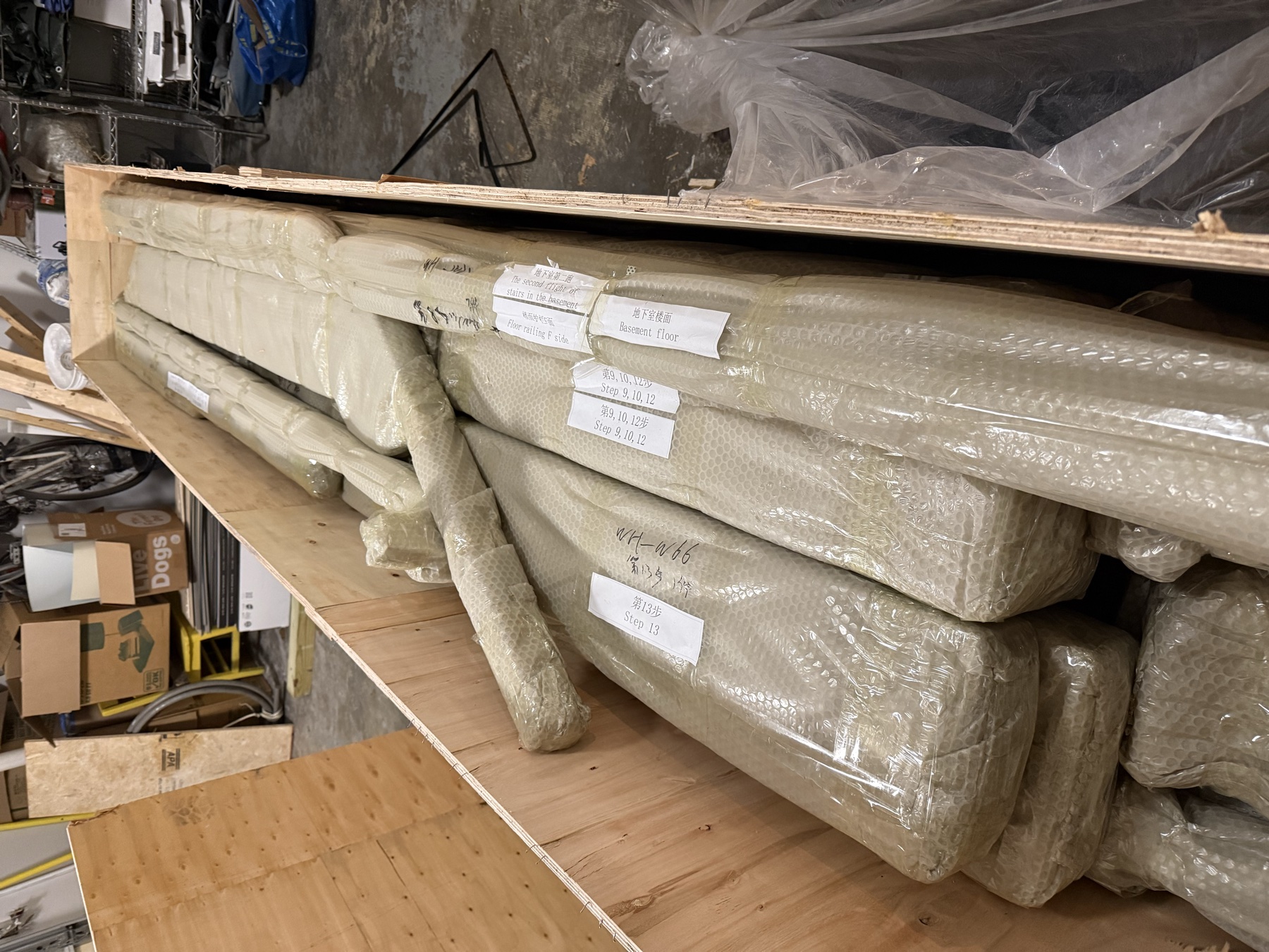 Packed staircase materials in garage — on-site in Atlanta, GA, ready for pickup