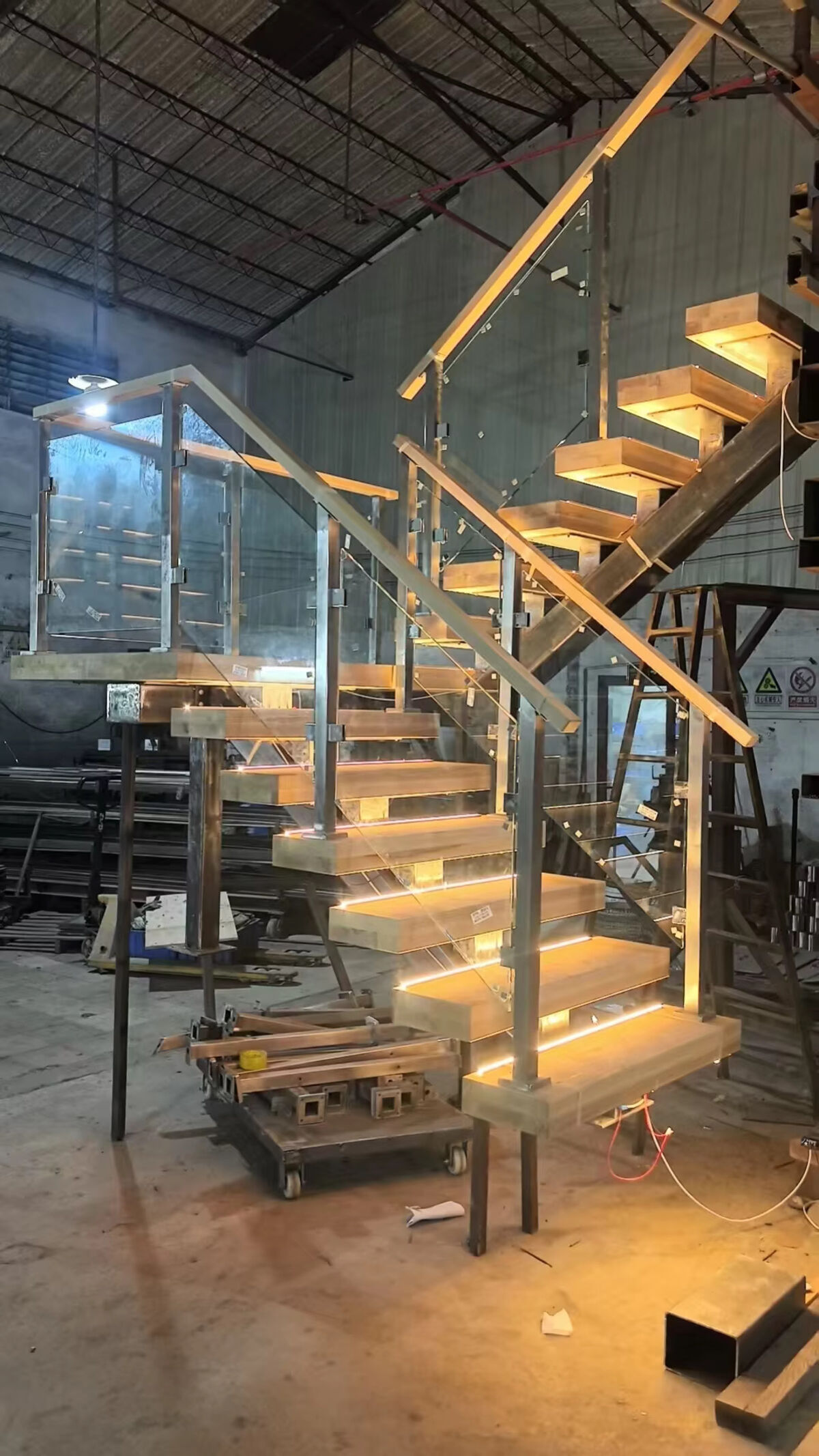 Steel switchback staircase — trial assembly at fabrication warehouse